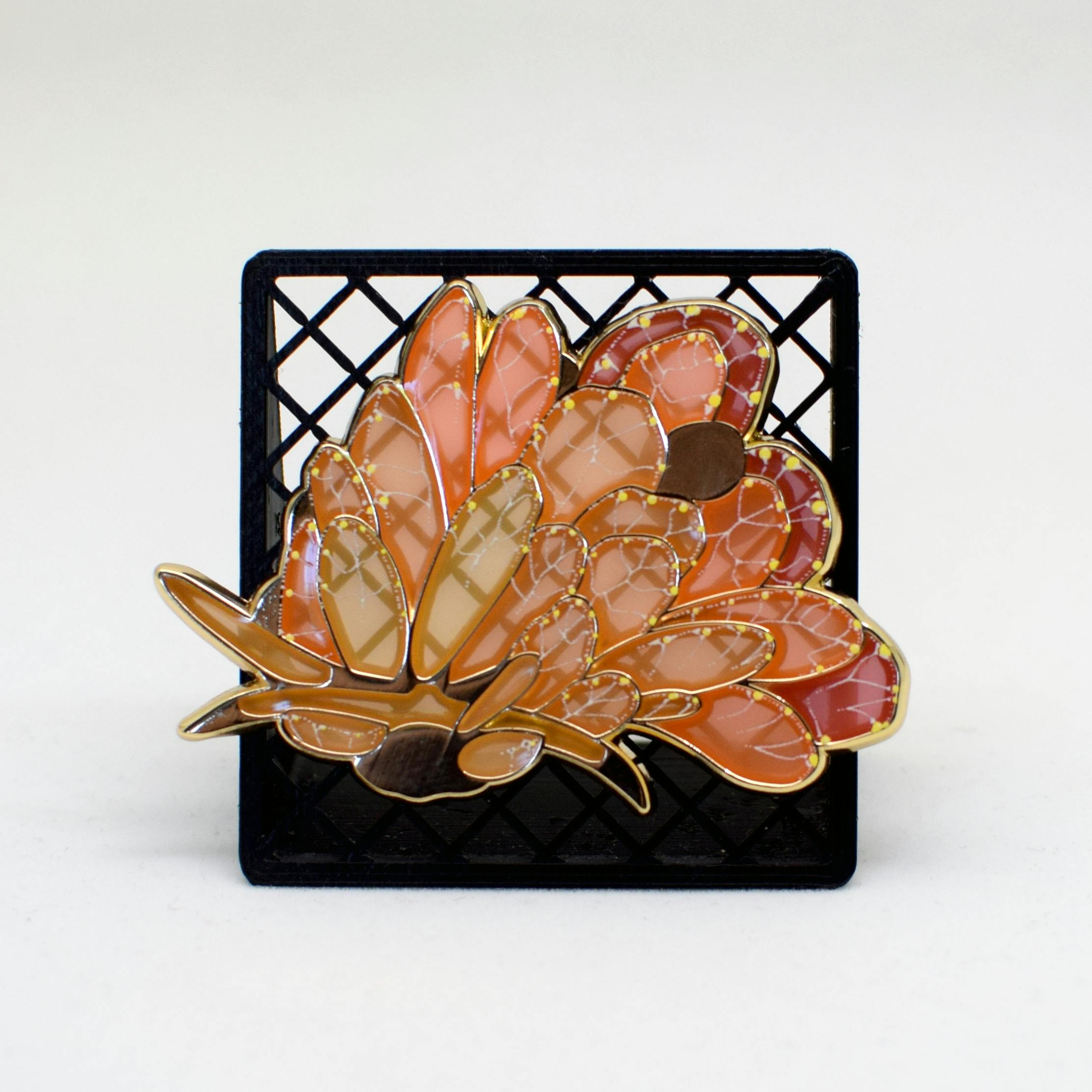 Cyerce Elegans Orange Pin	