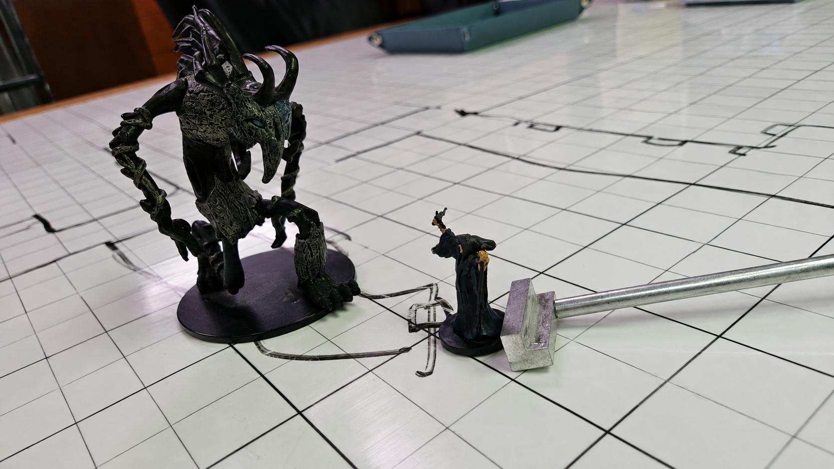 MiniMover: Move Miniatures Without Reaching Across the Table
