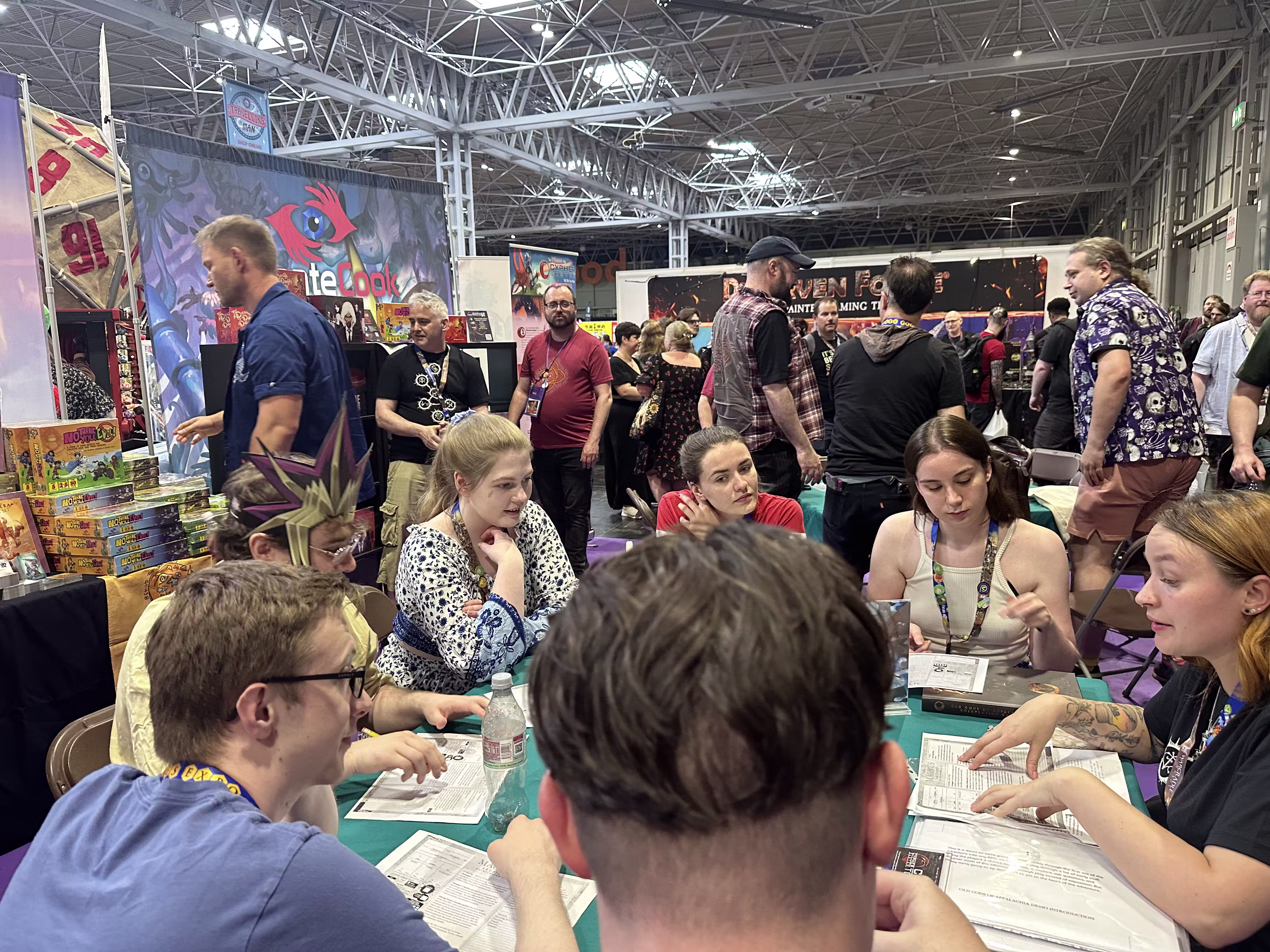 Monte Cook Games Booth at UKGE 2025 with demos in full flow