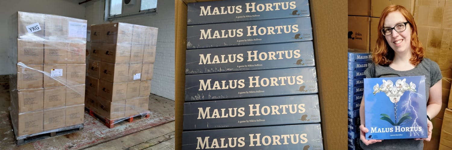  Photos of pallets with games being delivered, a box full of Malus Hortus games and of me holding a copy of Malus Hortus