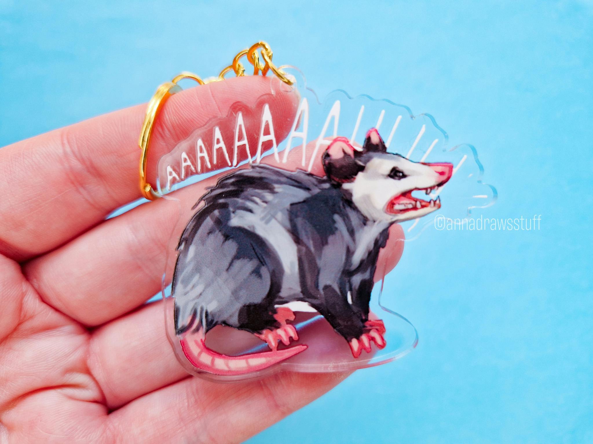 Screaming opossum acrylic keychain