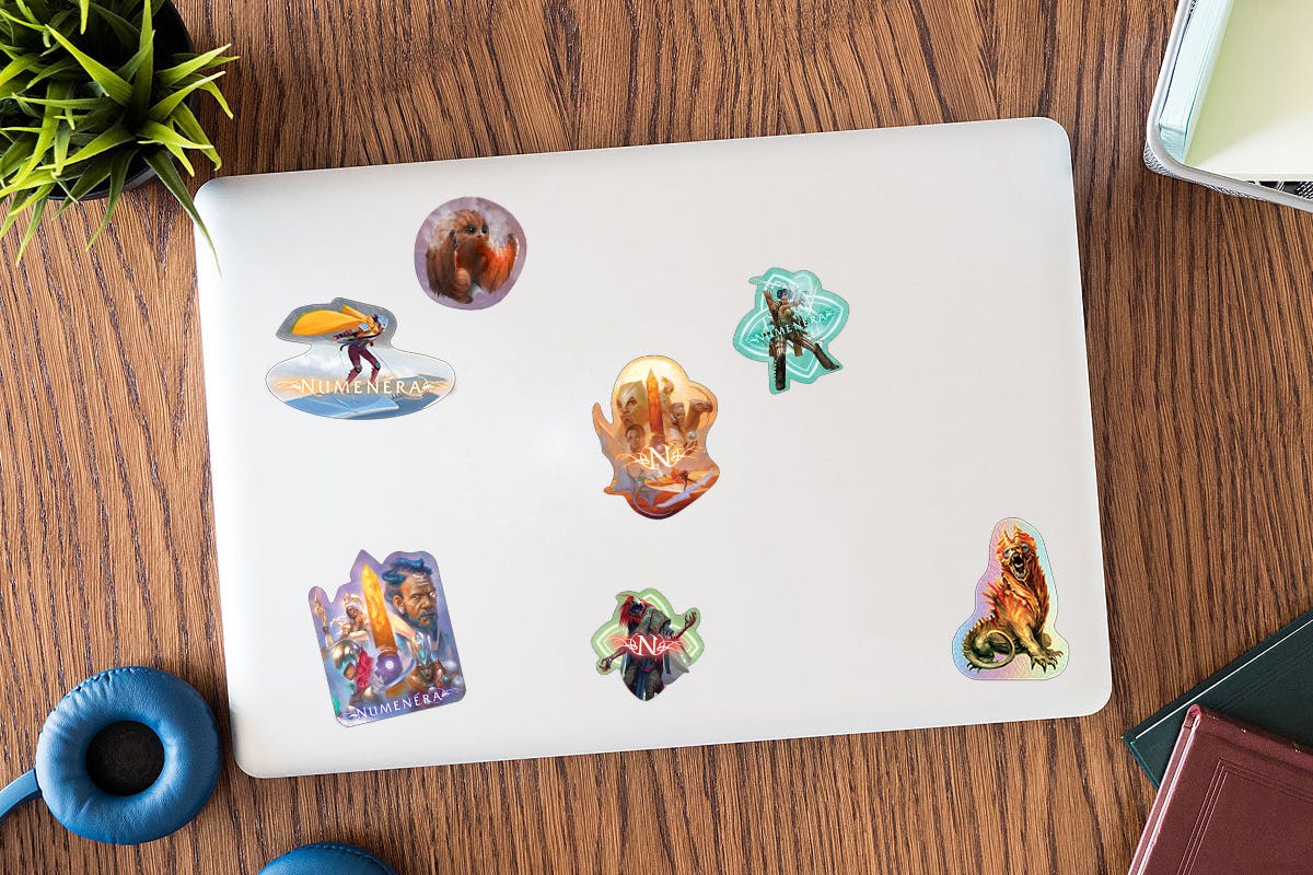 Mockup of a laptop with the unlocked stickers on it.