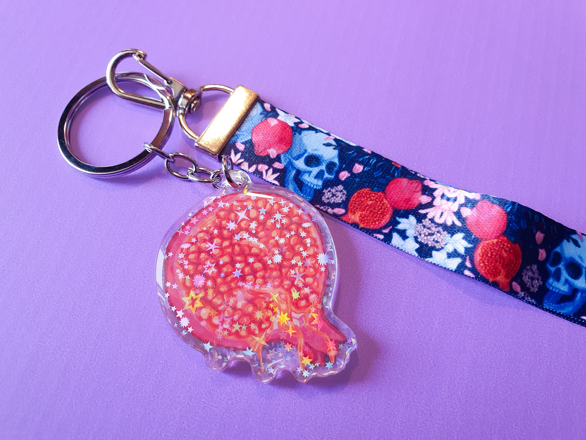 Skull and poms wristlet