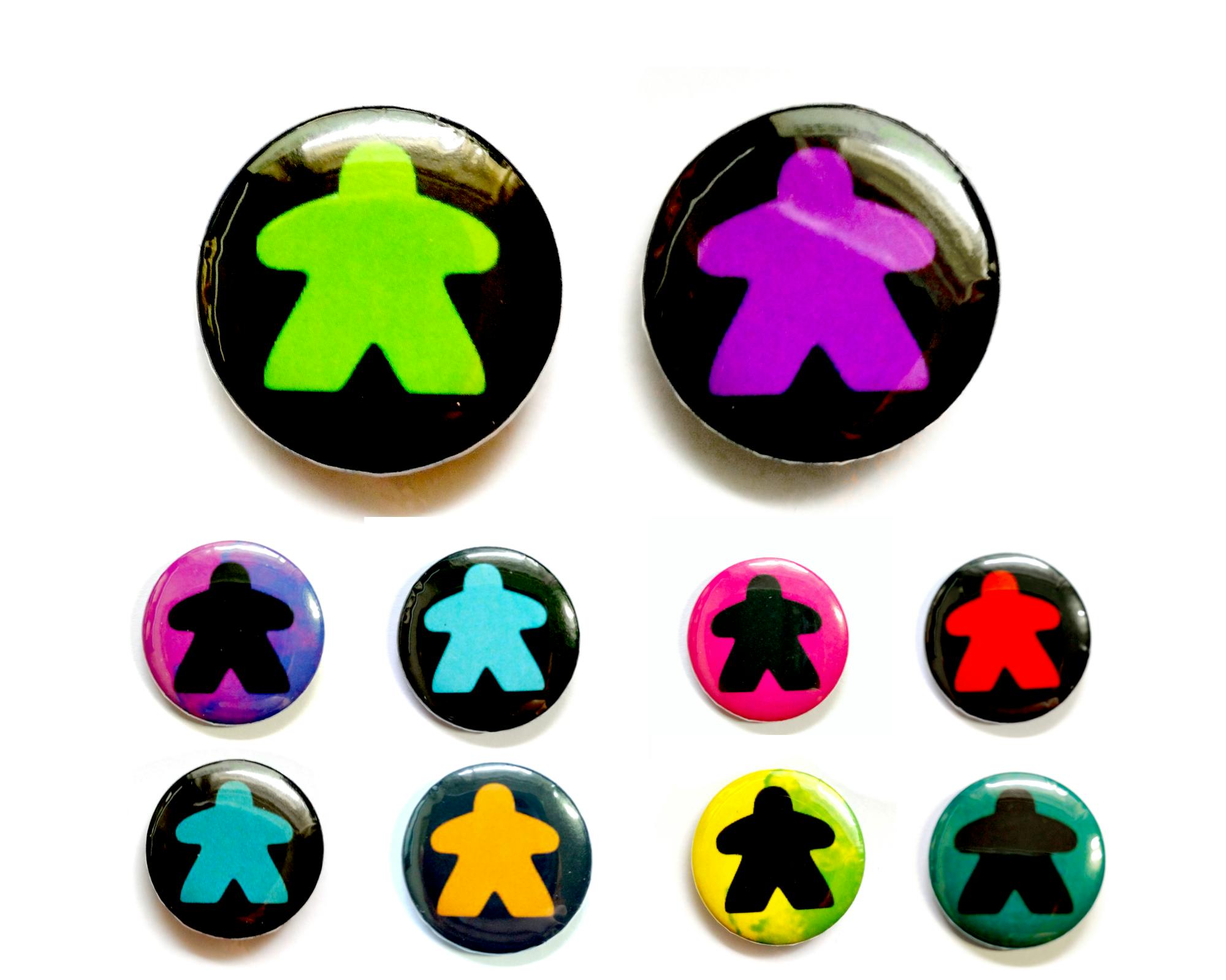  25mm button badges with various colour meeples