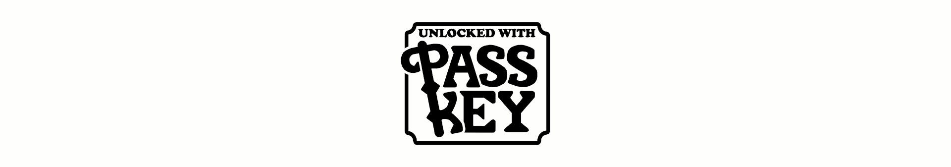 An image showing a square with indented, decorative corners, inside of which is text that reads: "Unlocked with Passkey".