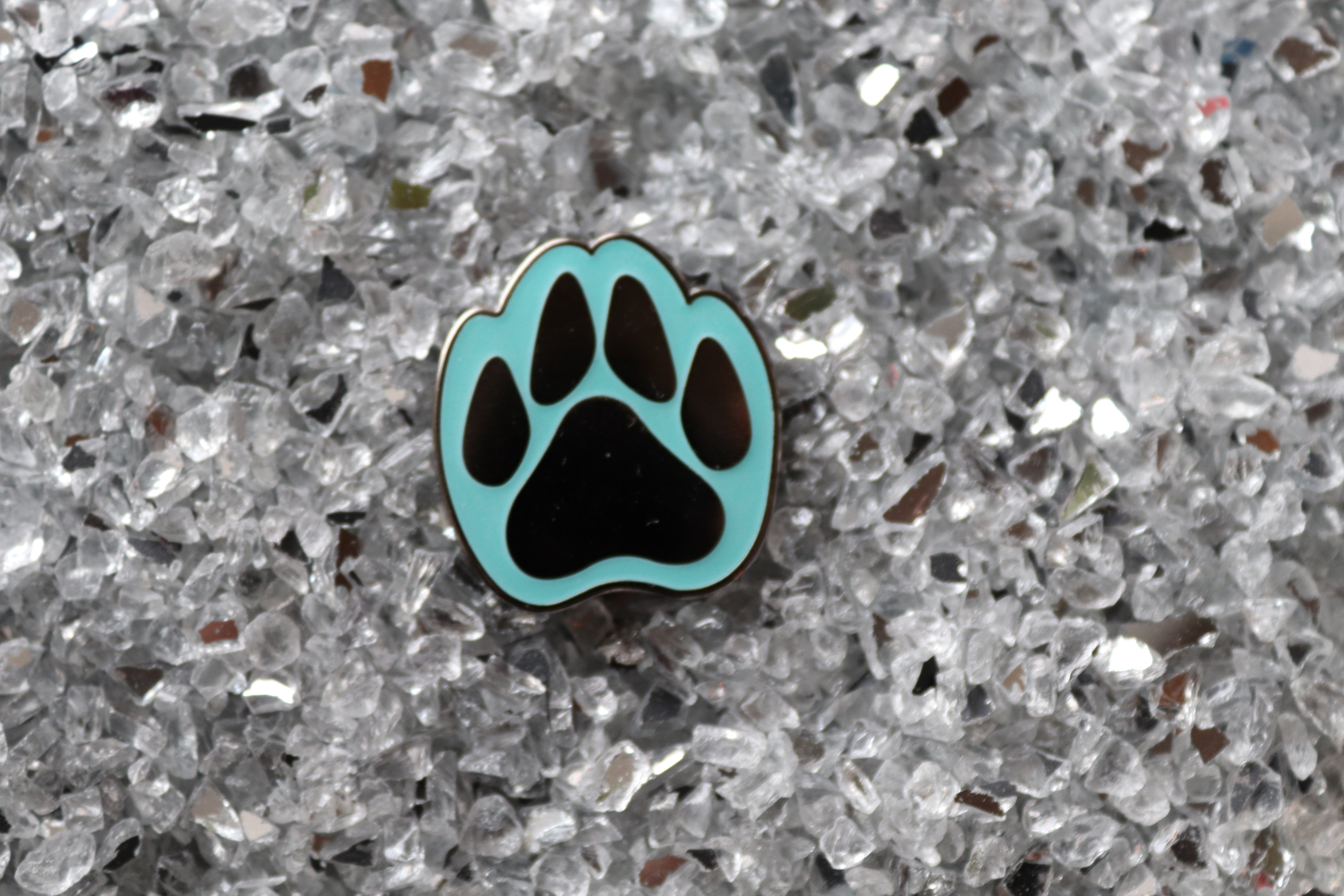 Blue glow paw print pin