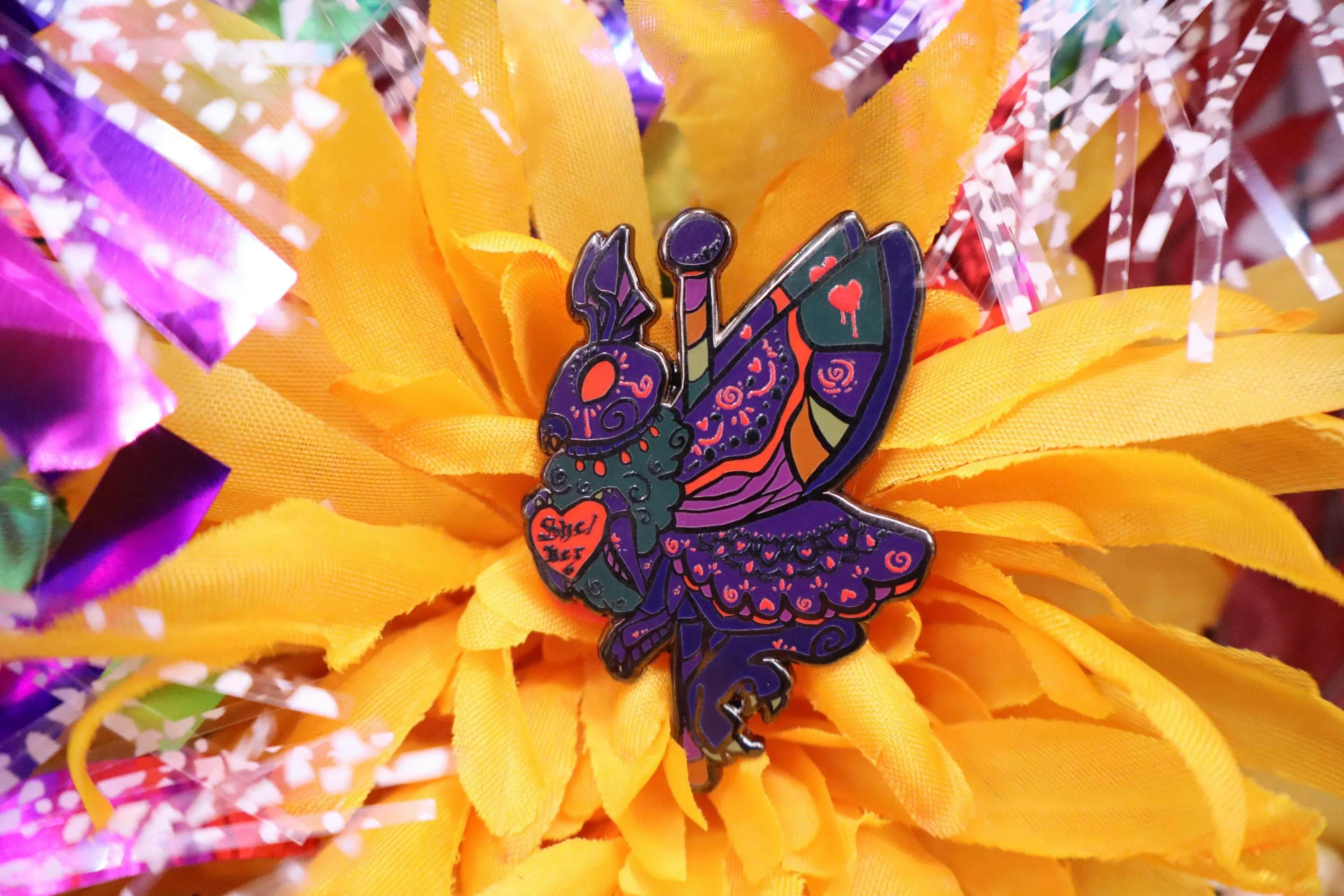 She/Her Mothman pronouns cryptid carousel enamel pin