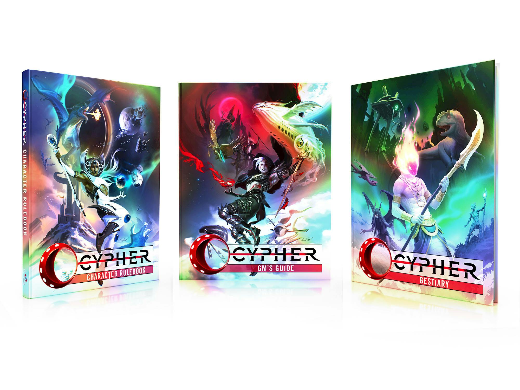 A mockup of the Cypher GM's Guide, flanked by the Cypher Character Rulebook and Cypher Bestiary, all showing off their lustrous foil covers.