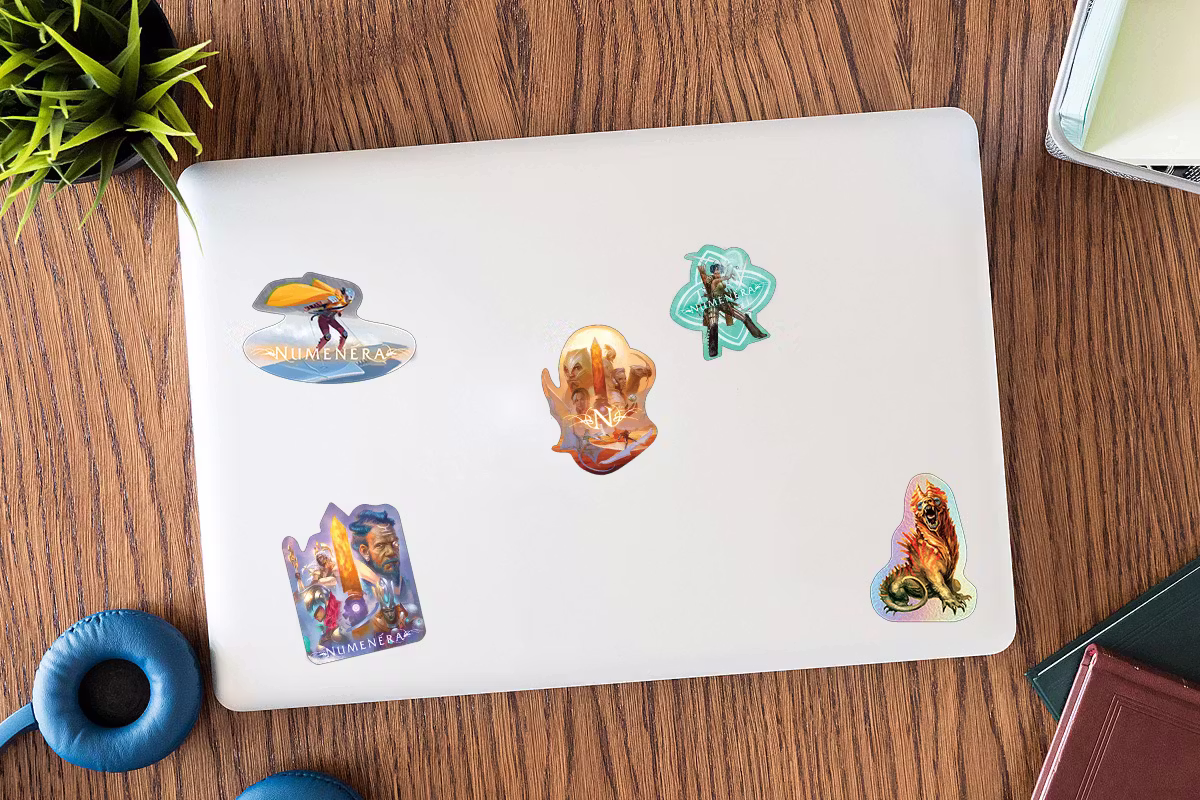 Mockup of a laptop with the unlocked stickers on it.