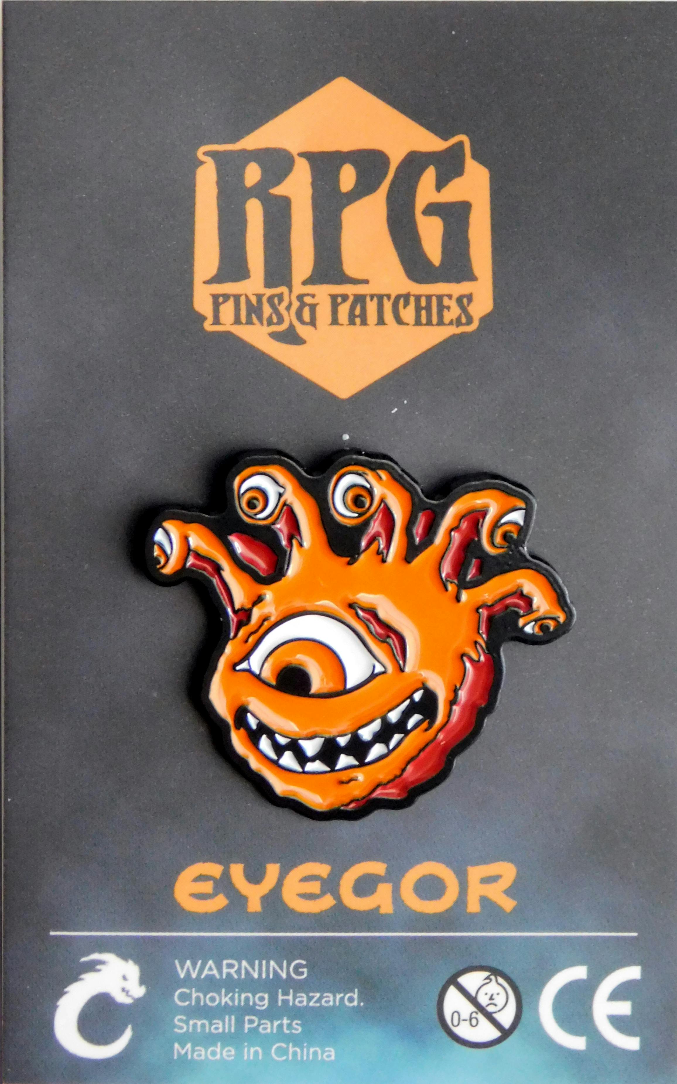 Eyegor – Orange enamel pin