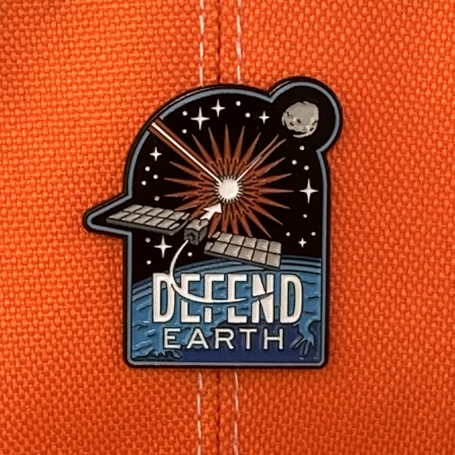 Defend Earth Dino Extinction Pin