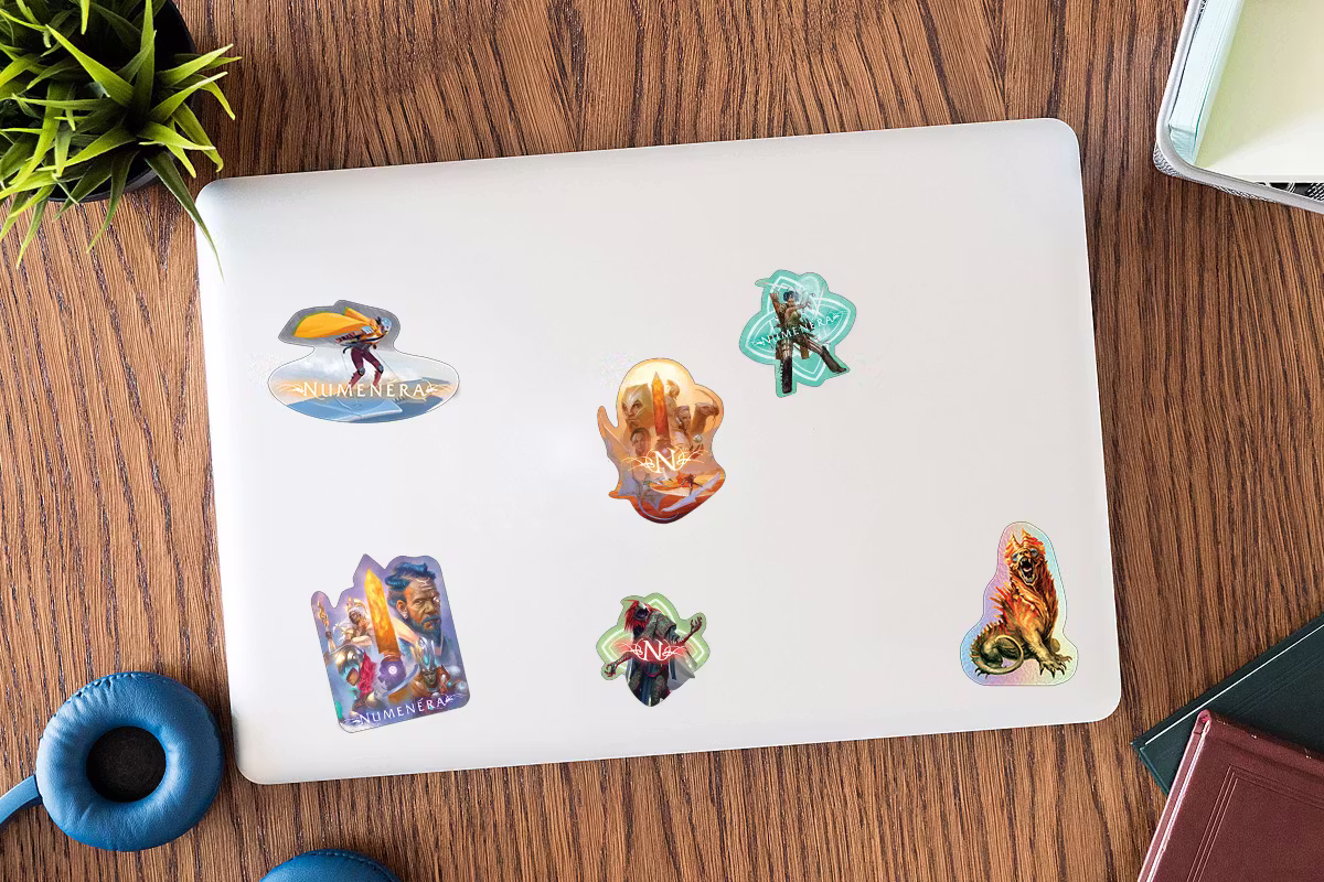 Mockup of a laptop with the unlocked stickers on it.