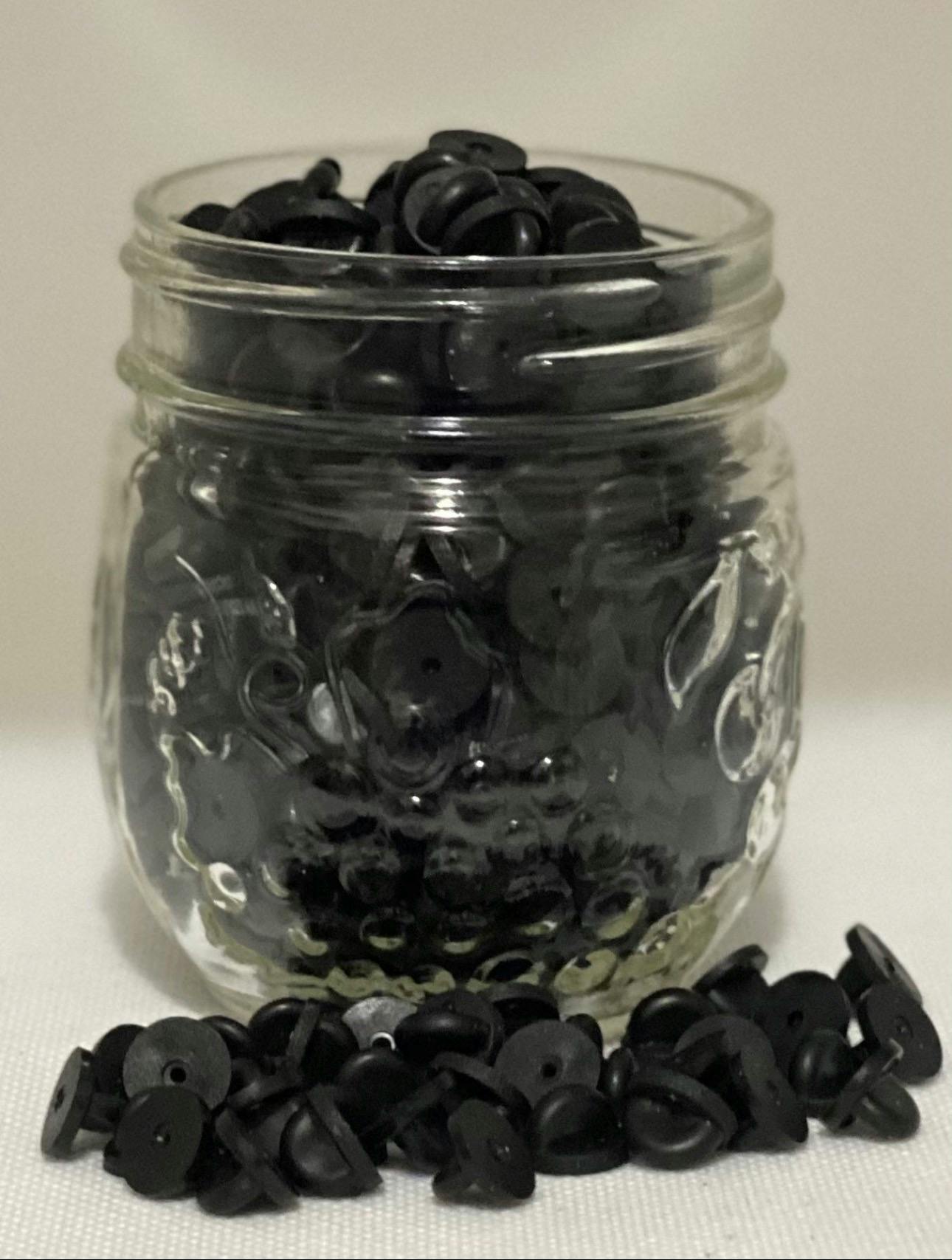 10 black circle rubber backs 