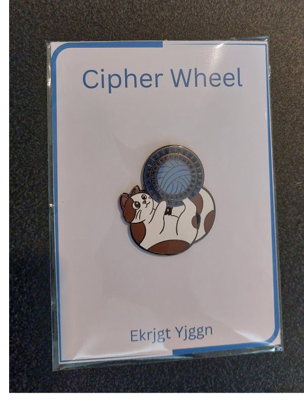 Cat Playing with Cipher Wheel Enamel Pin