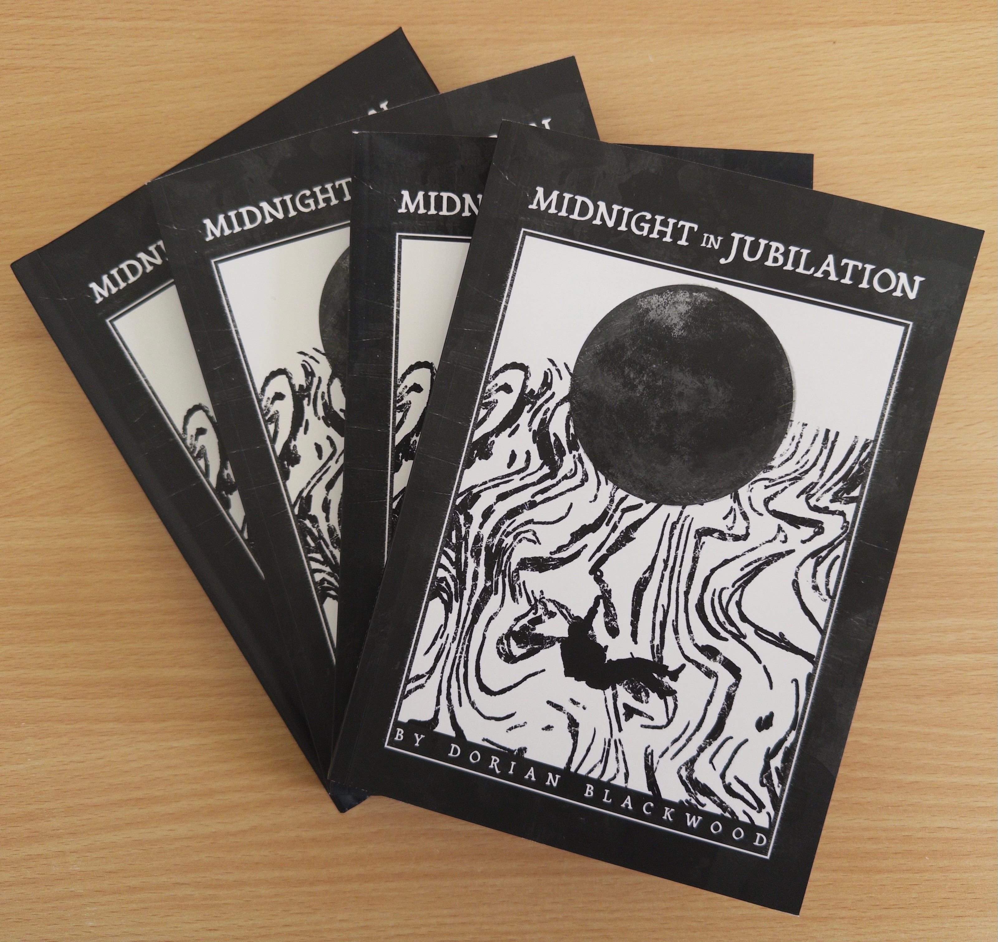 A stack of four A5 sized books, fanned out slightly like a deck of cards. Their covers read: "Midnight in Jubilation by Dorian Blackwood.