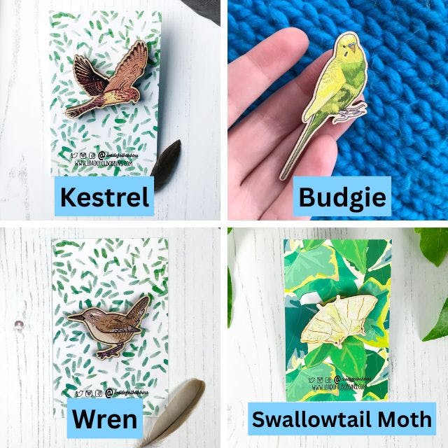 a grid of four wooden pins created from illustrations by Loadofolbobbins. Clockwise from top left a kestrel, a lime and yellow budgie, a swallowtail moth and a wren.https://www.backerkit.com/c/projects/loadofolbobbins/loadofolbobbins-holiday-shop