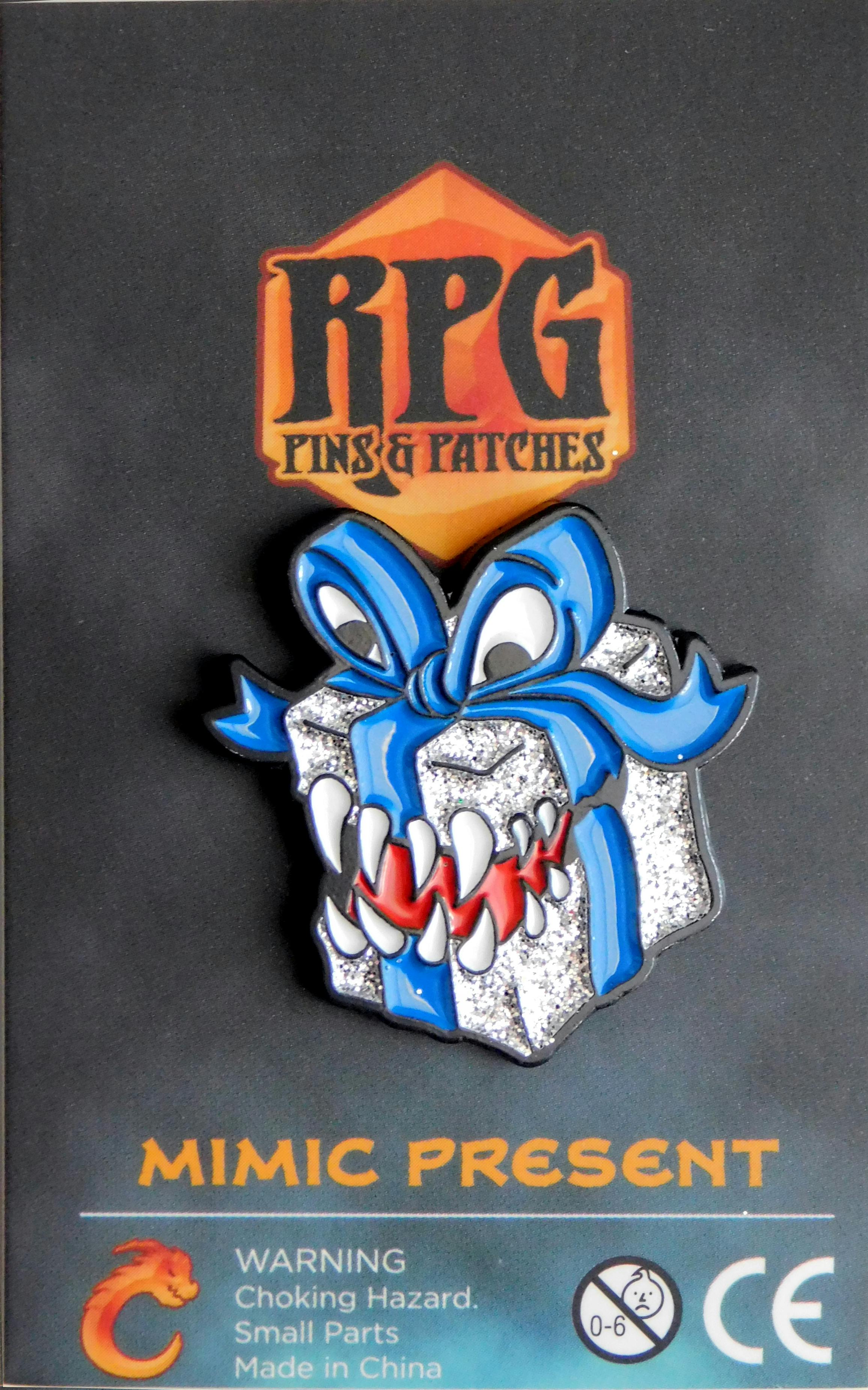 Mimic Present – Blue & Silver enamel pin
