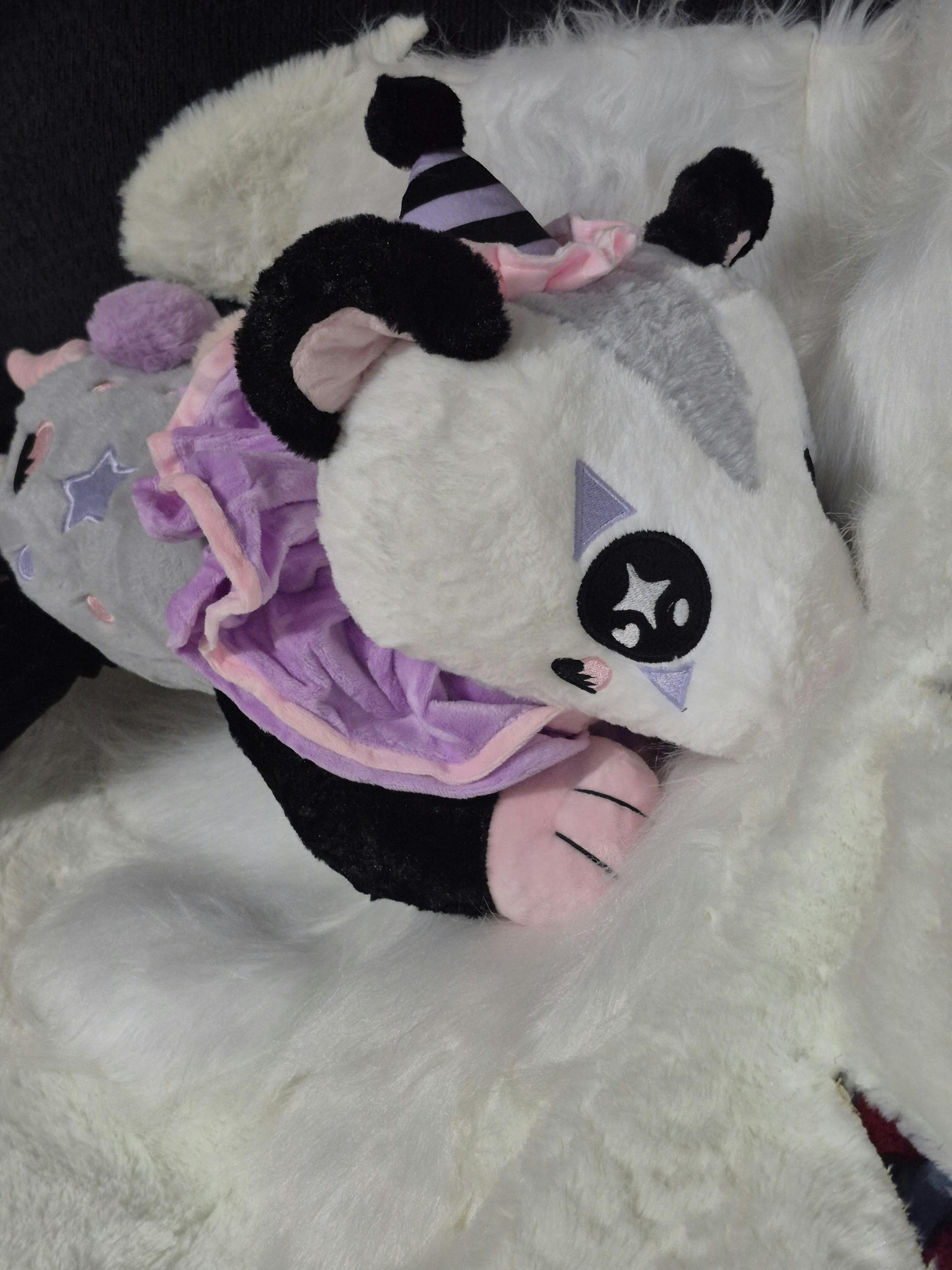 One Poppet the weighted clown possum plushie