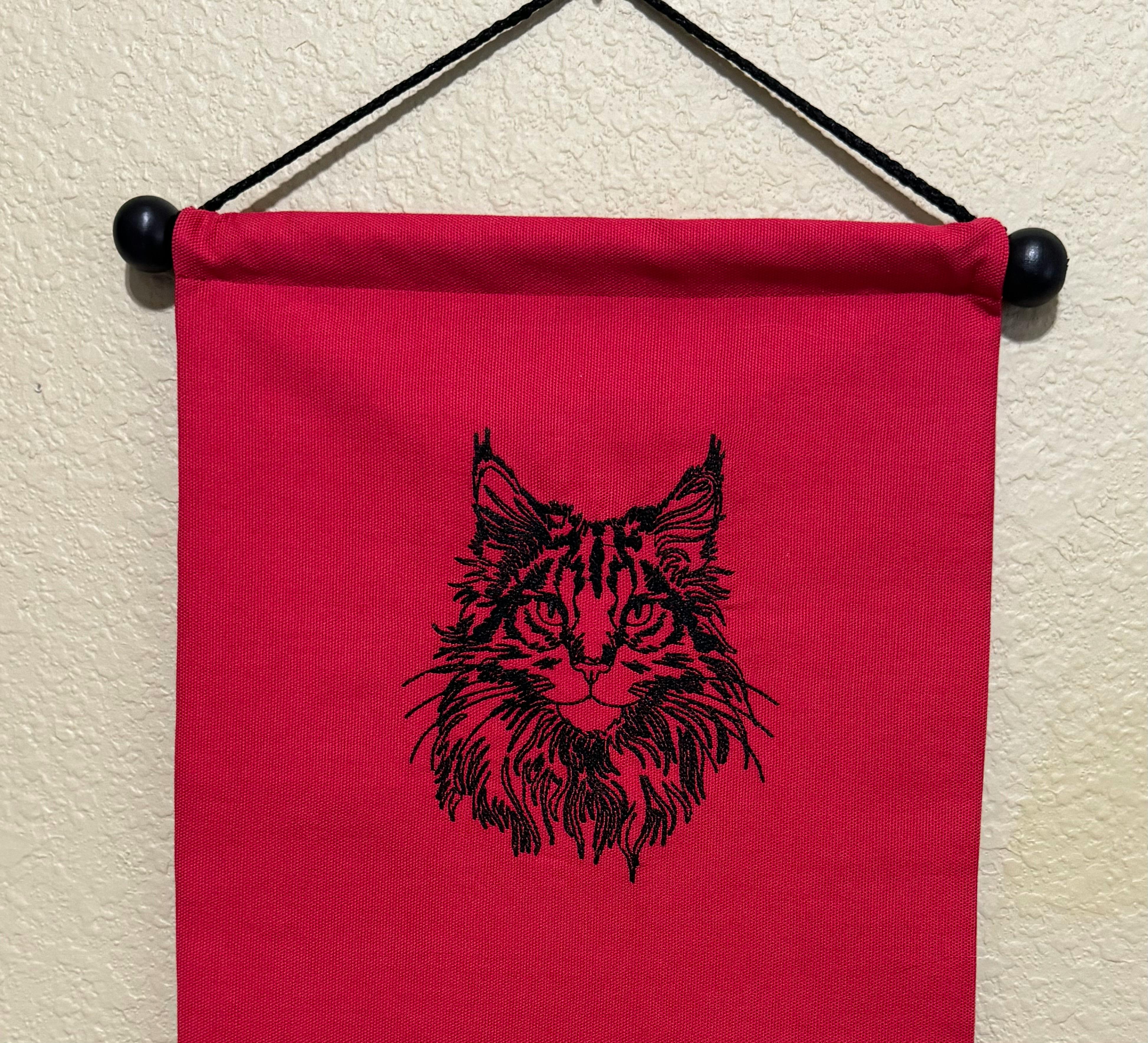 Black Maine Coon on Red banner