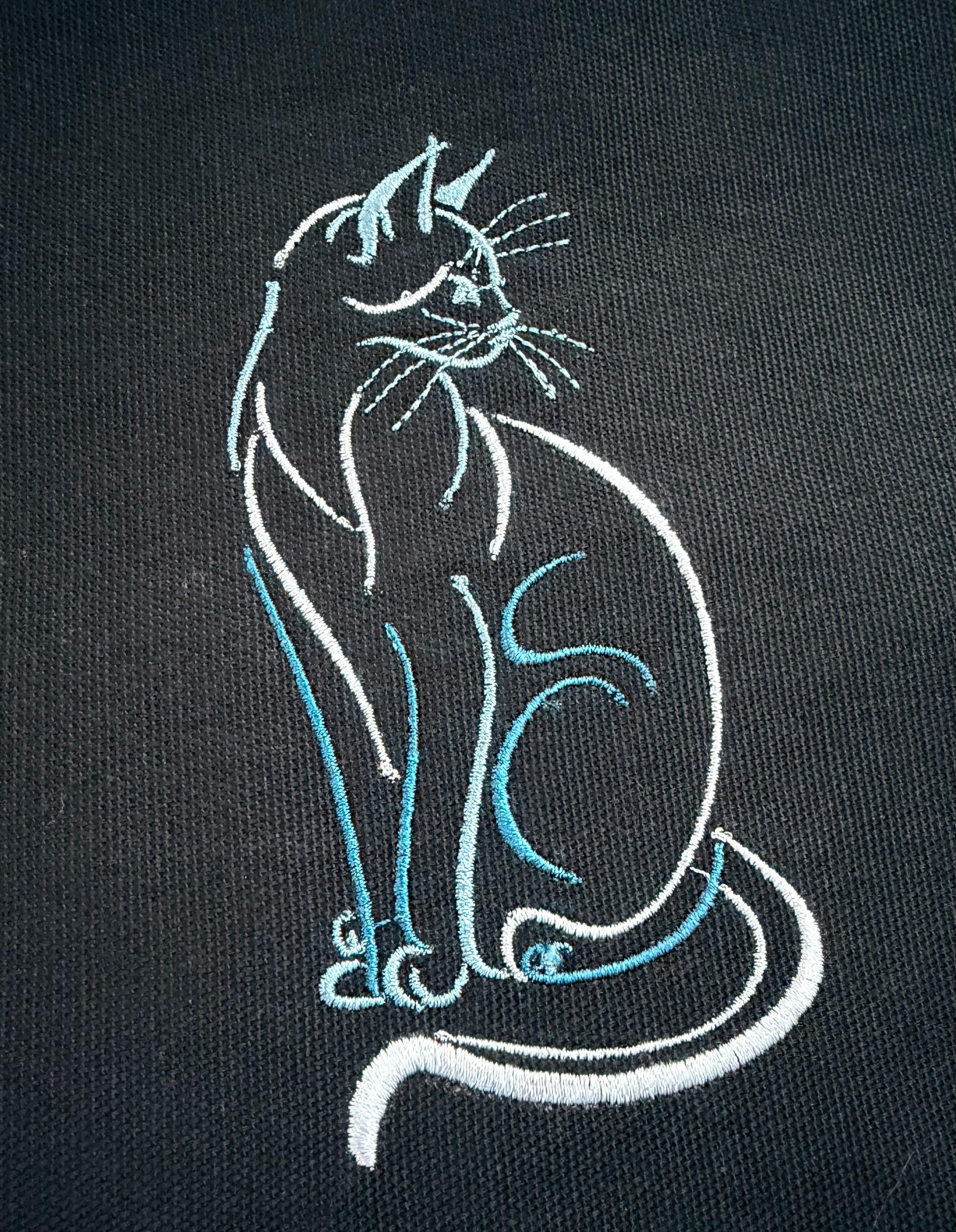 Blue tones on black cat pin banner