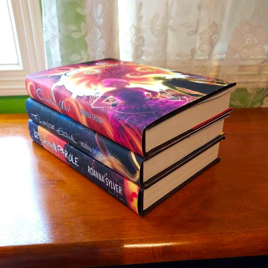 Stacked photo showing these are beautiful physical books!