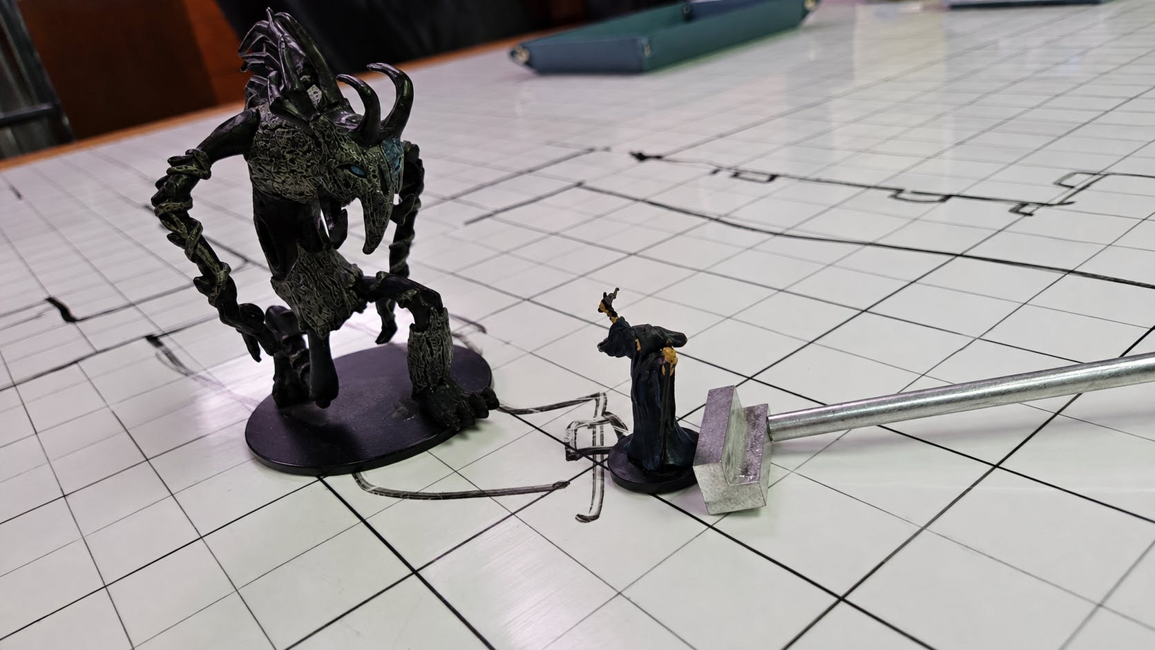 MiniMover: Move Miniatures Without Reaching Across the Table