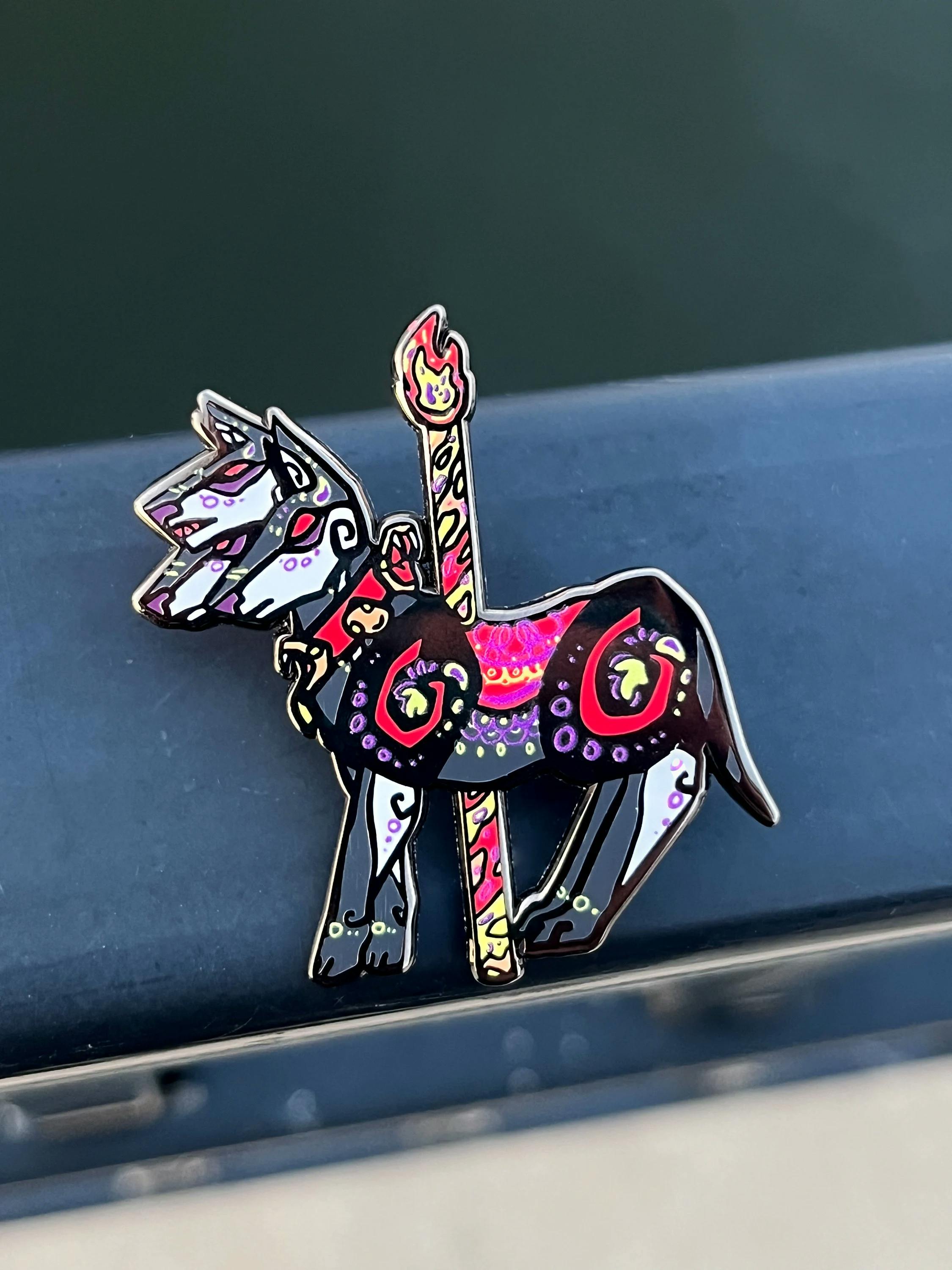 Cerberus carousel pin