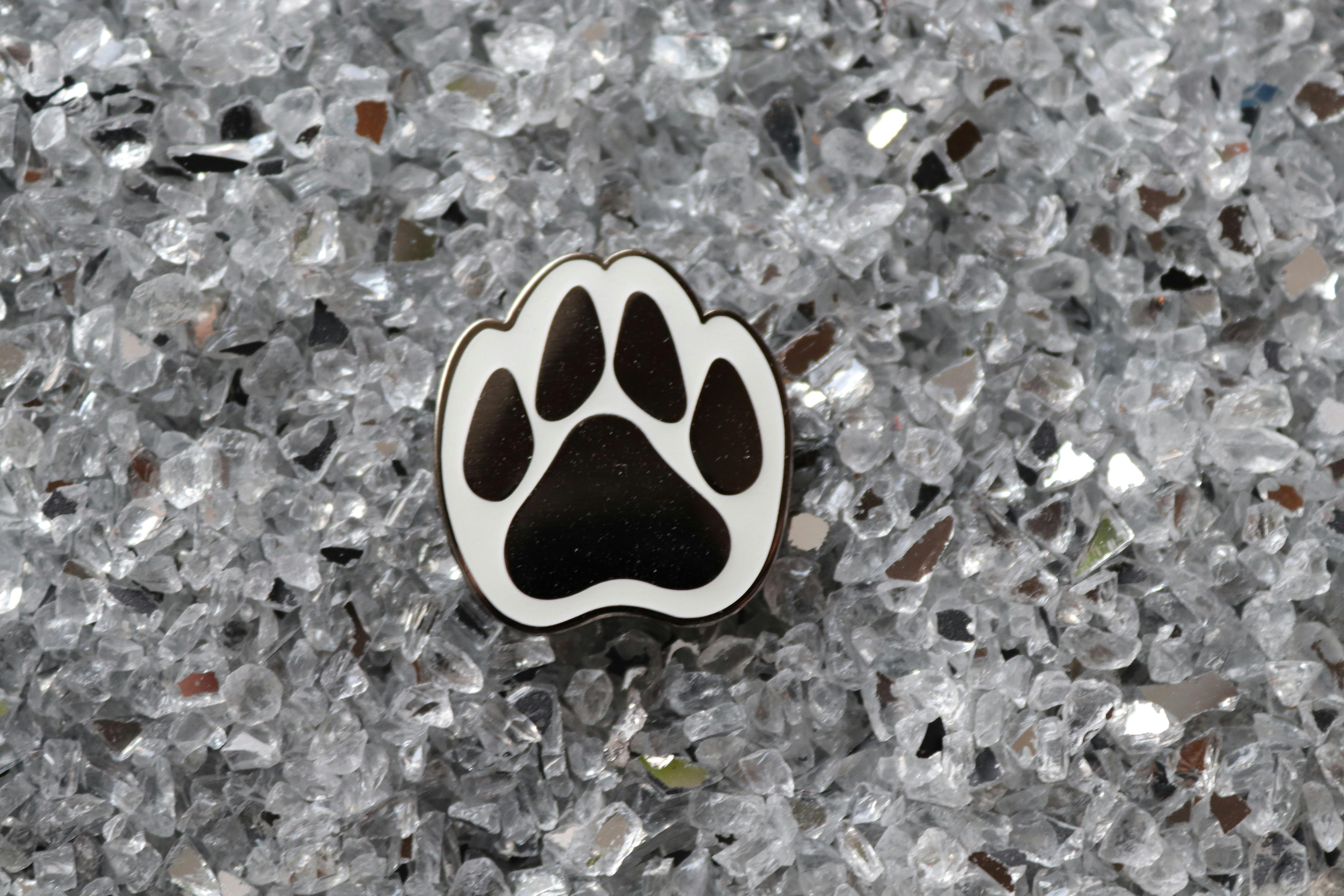 White paw print pin