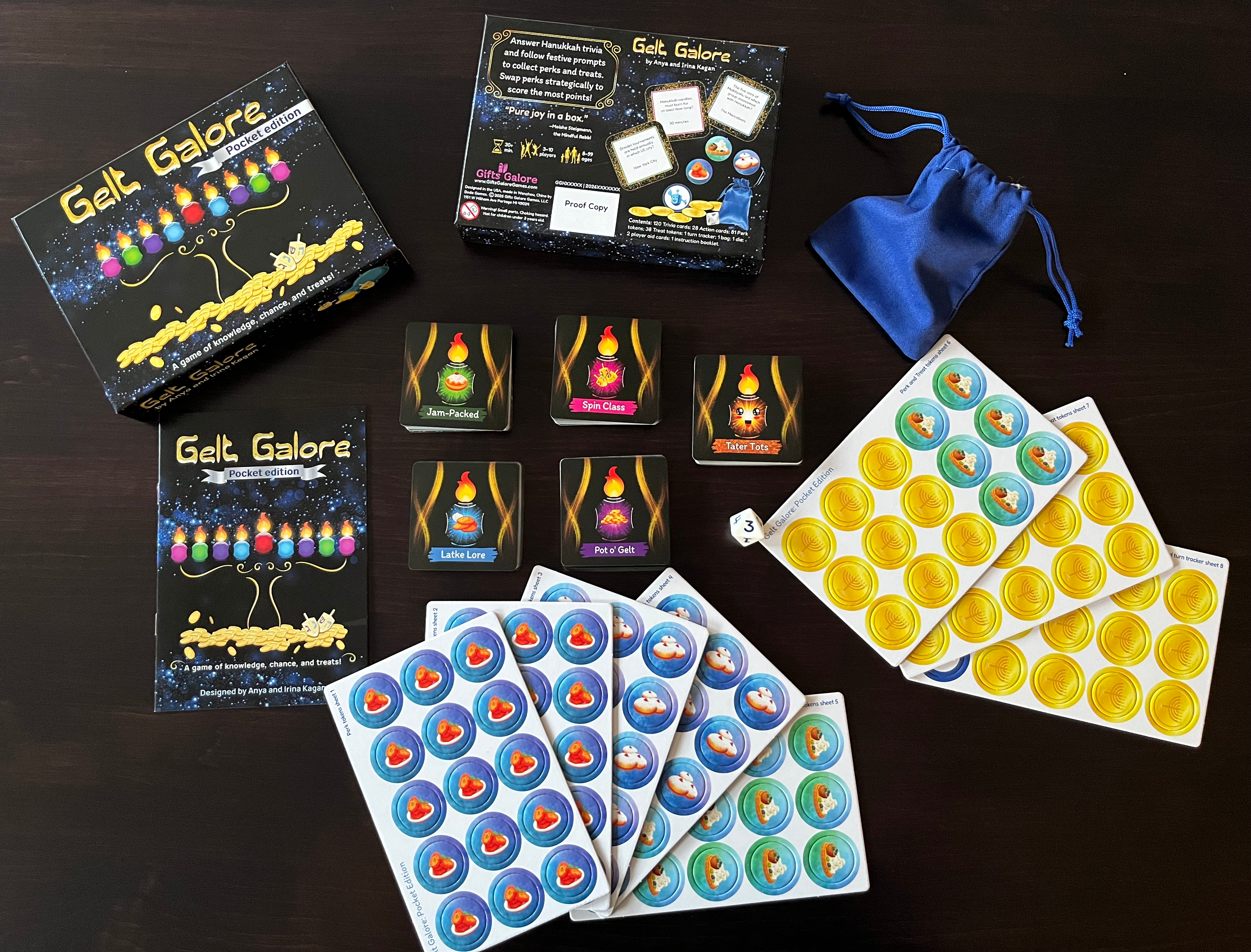 Photo of Gelt Galore: Pocket Edition preview copy, box and components laid out.