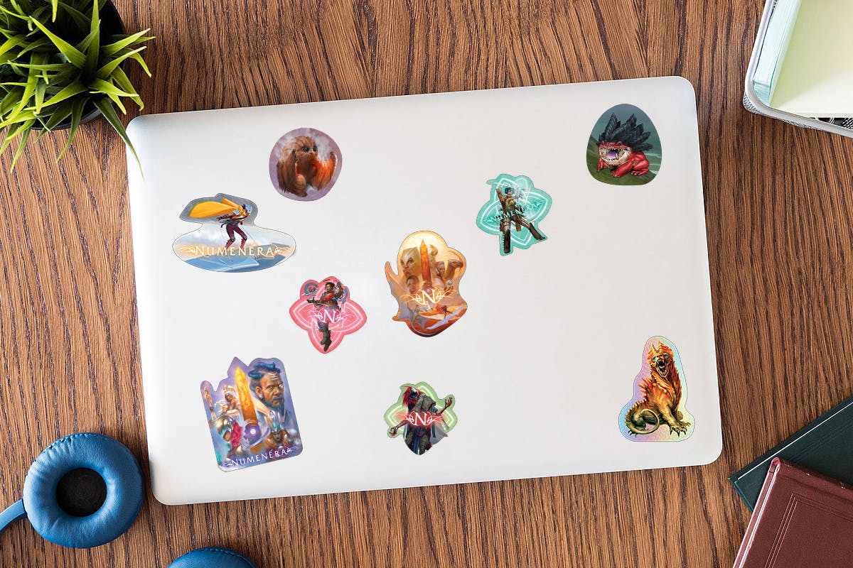 Mockup of a laptop with the unlocked stickers on it.