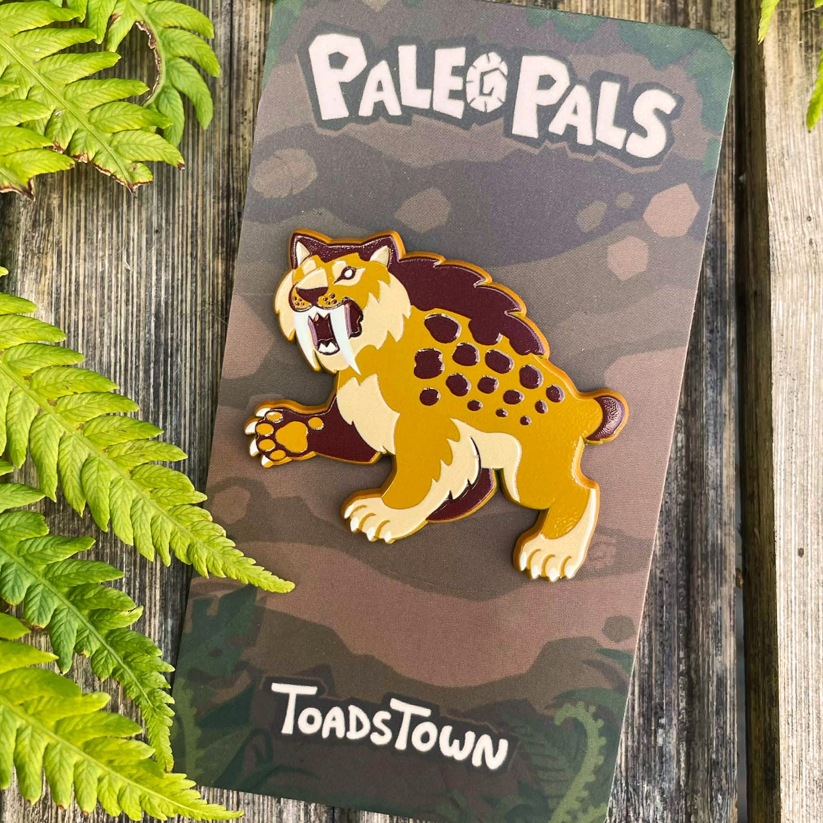 Smilodon Dyed Enamel Pin