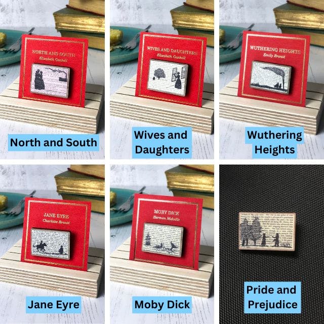 a grid of six wooden pins created from illustrations by Loadofolbobbins, silhouette scenes from classic literature. Clockwise from top left North and South, Wives and Daughters both by Elizabeth Gaskell, Wuthering Heights by Emily Brontë, Pride and Prejudice by Jane Austen, Moby Dick by Melville and Jane Eyre by Charlotte Brontë.https://www.backerkit.com/c/projects/loadofolbobbins/loadofolbobbins-holiday-shop