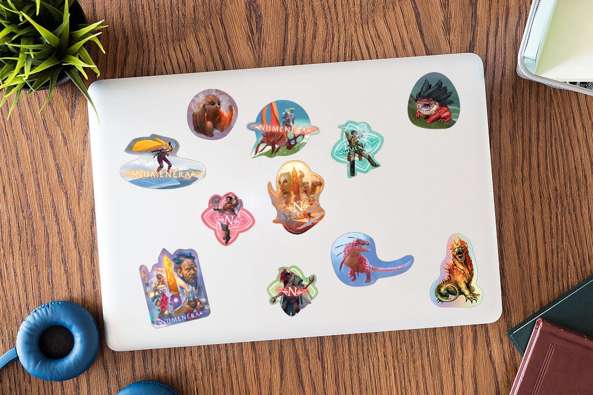 Mockup of a laptop with the unlocked stickers on it.