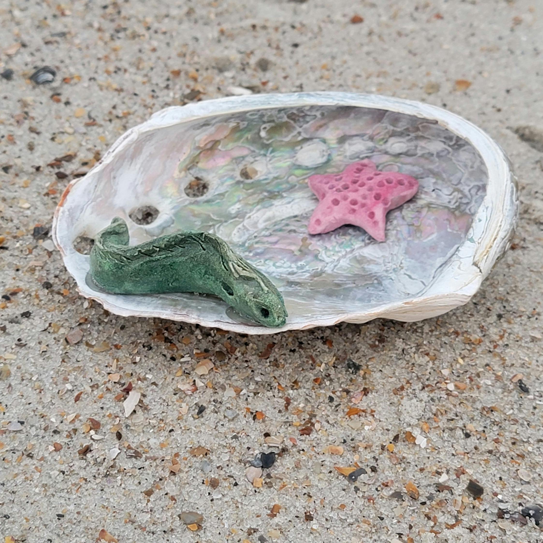 Small moray eel abalone shell sculpture  