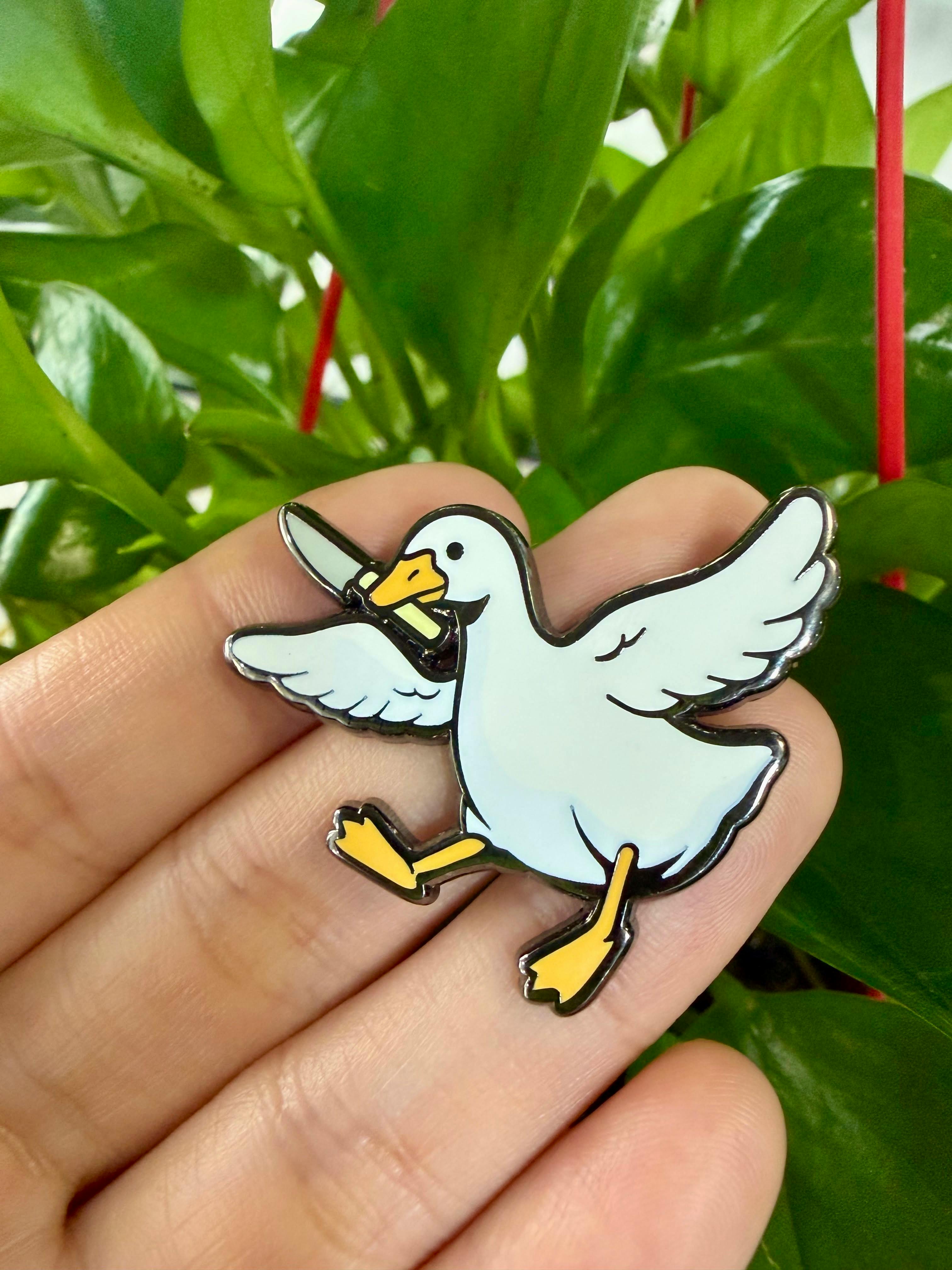 Goose with a knife pin