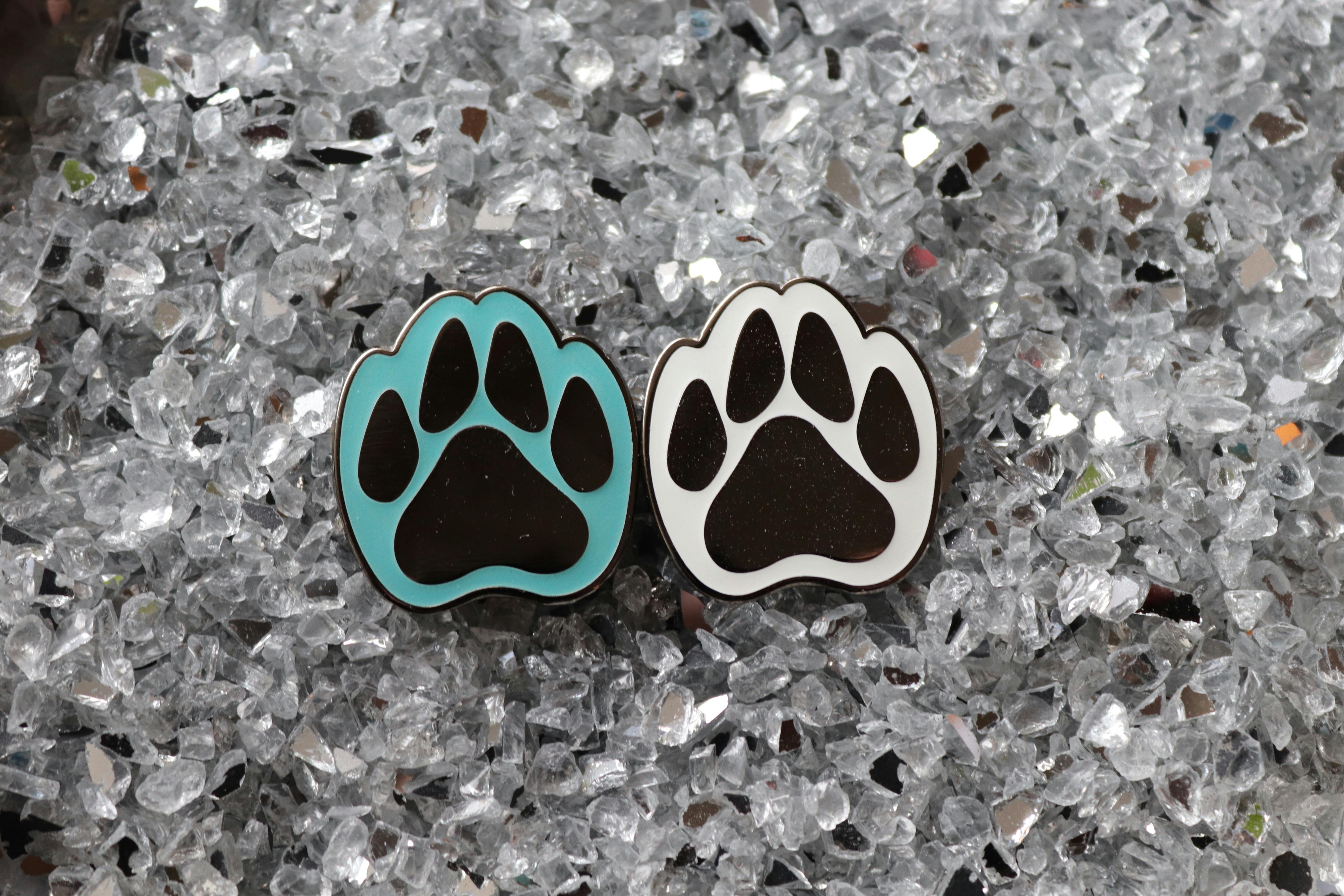 2 pack paw print pins (glow in dark)