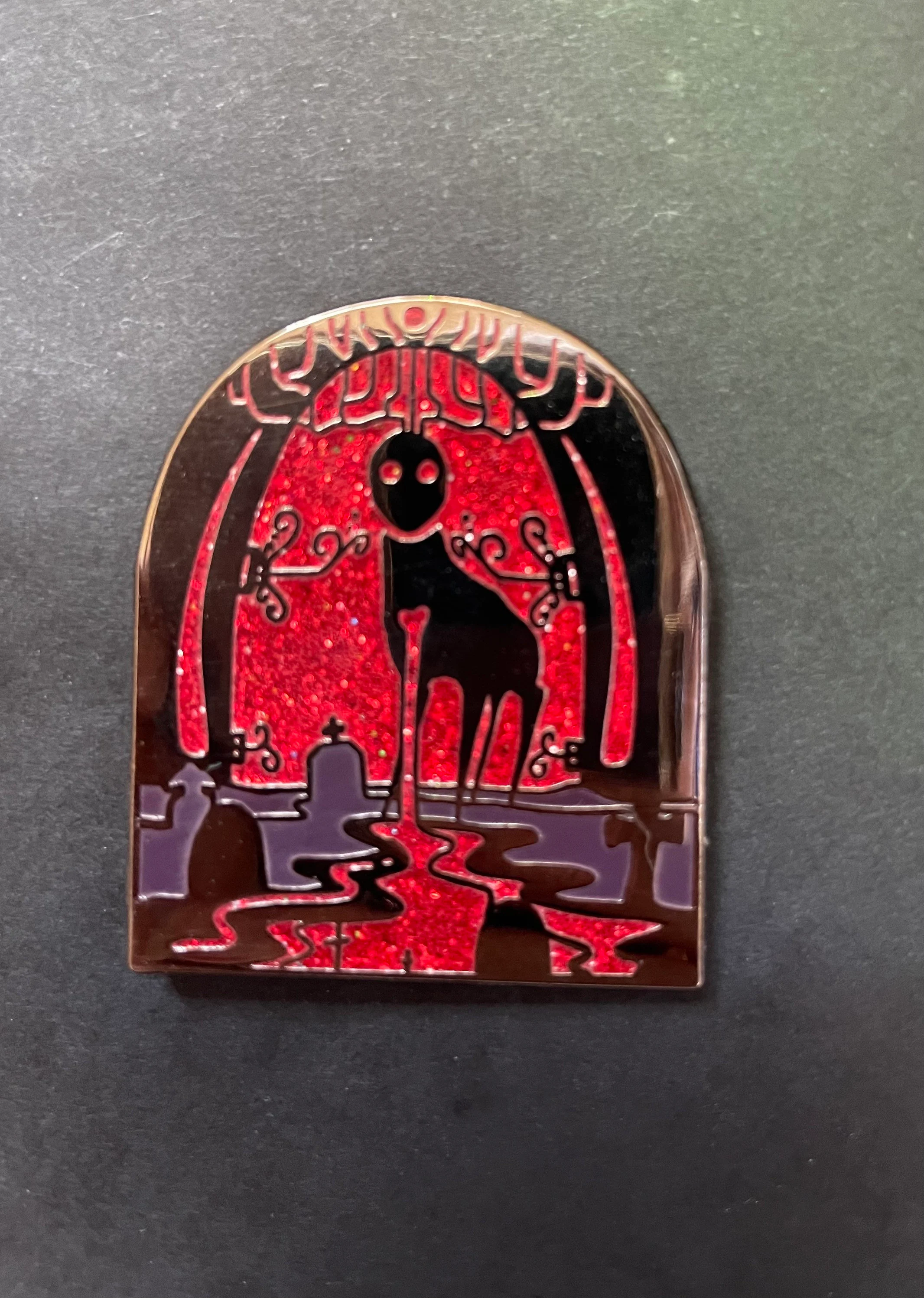 Church grim glitter pin