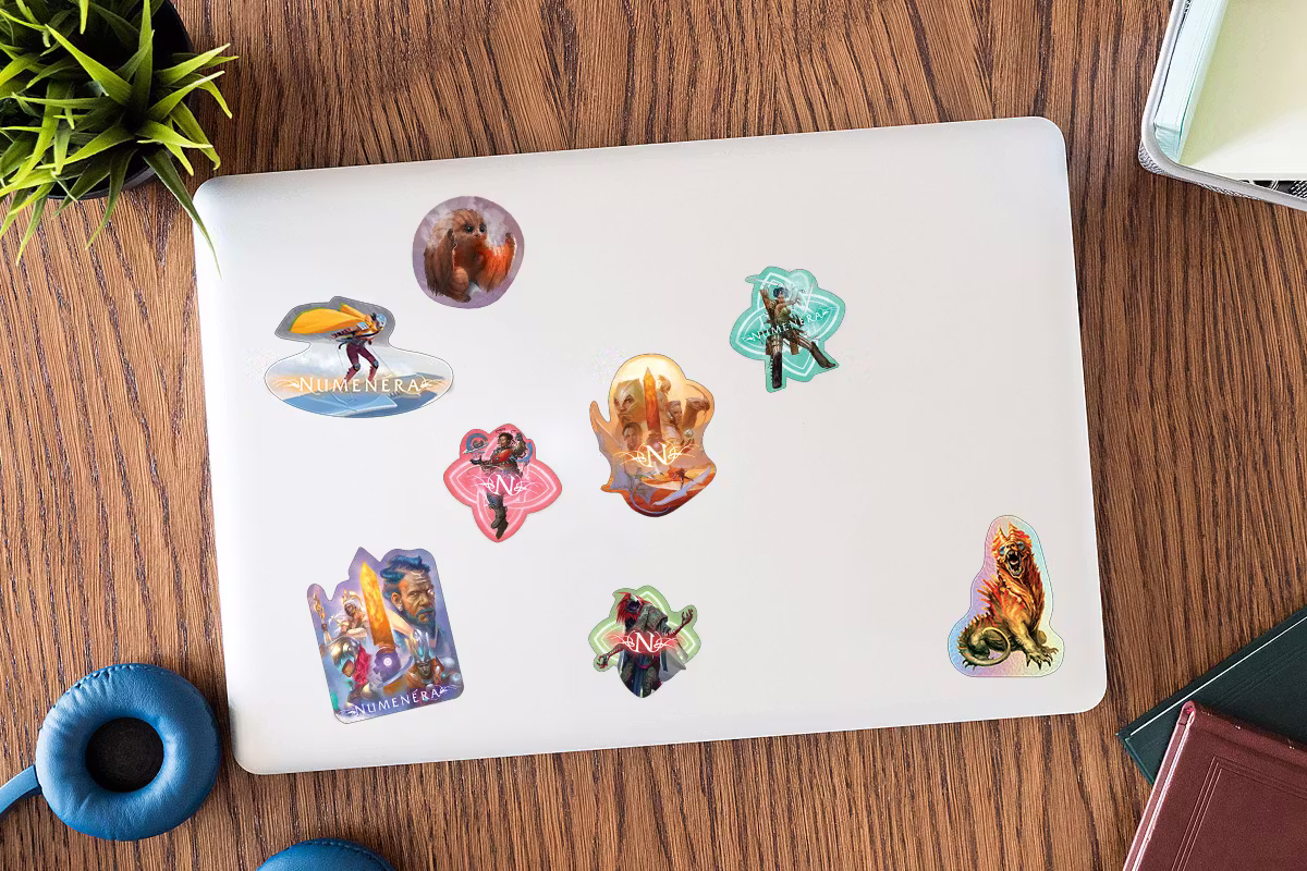 Mockup of a laptop with the unlocked stickers on it.